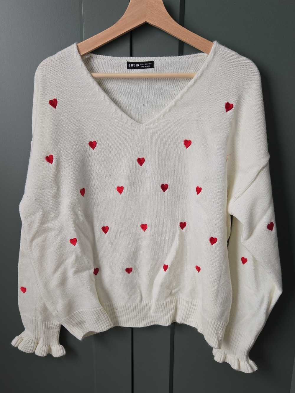 SHEIN Cream V-Neck Sweater with Red Heart Accents